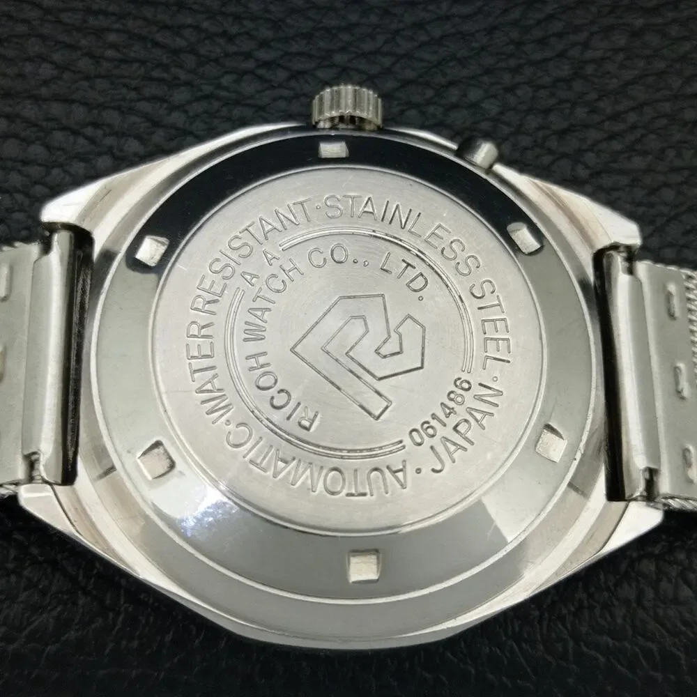 Vintage 1976 Ricoh Automatic Mens Silver Watch W/daydate & Red accents